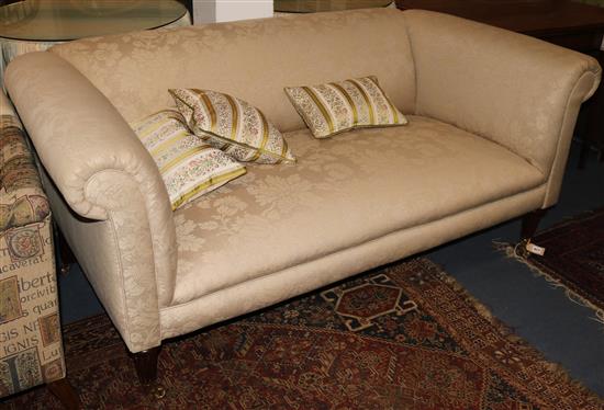 A Georgian style mahogany settee covered in brocade, 175cm wide